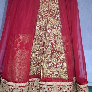 Red Lehenga with full length gown